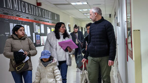 A family attends immigration court. 