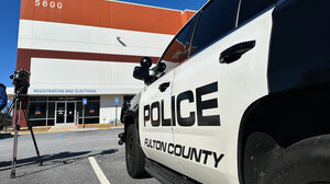 Fulton County police cruiser outside elections office
