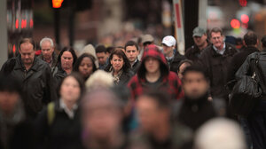 Crowd on city sidewalk
