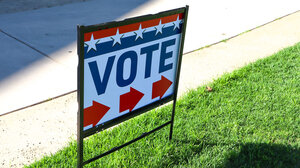 Vote sign pointing to polling place
