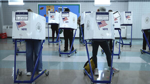 Voters at voting booths