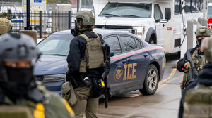 ICE officers and ICE police-style car