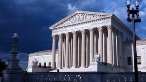 Supreme Court with storm clouds behind