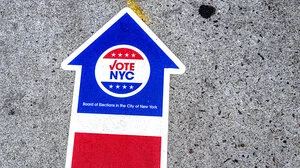 VoteNYC on arrow signage on ground